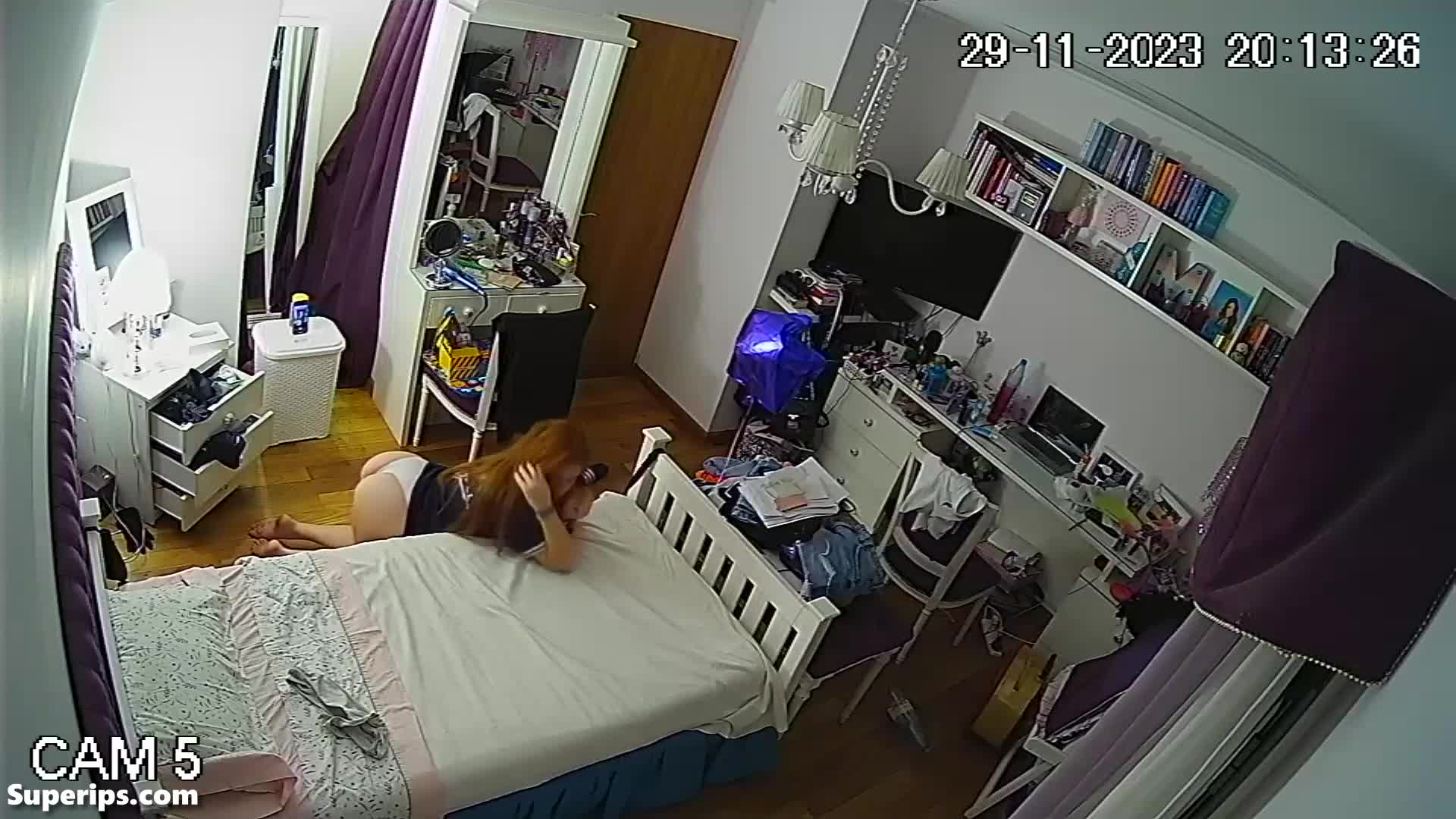 IPCAM – Naughty redhead girl makes TikToks in lingerie