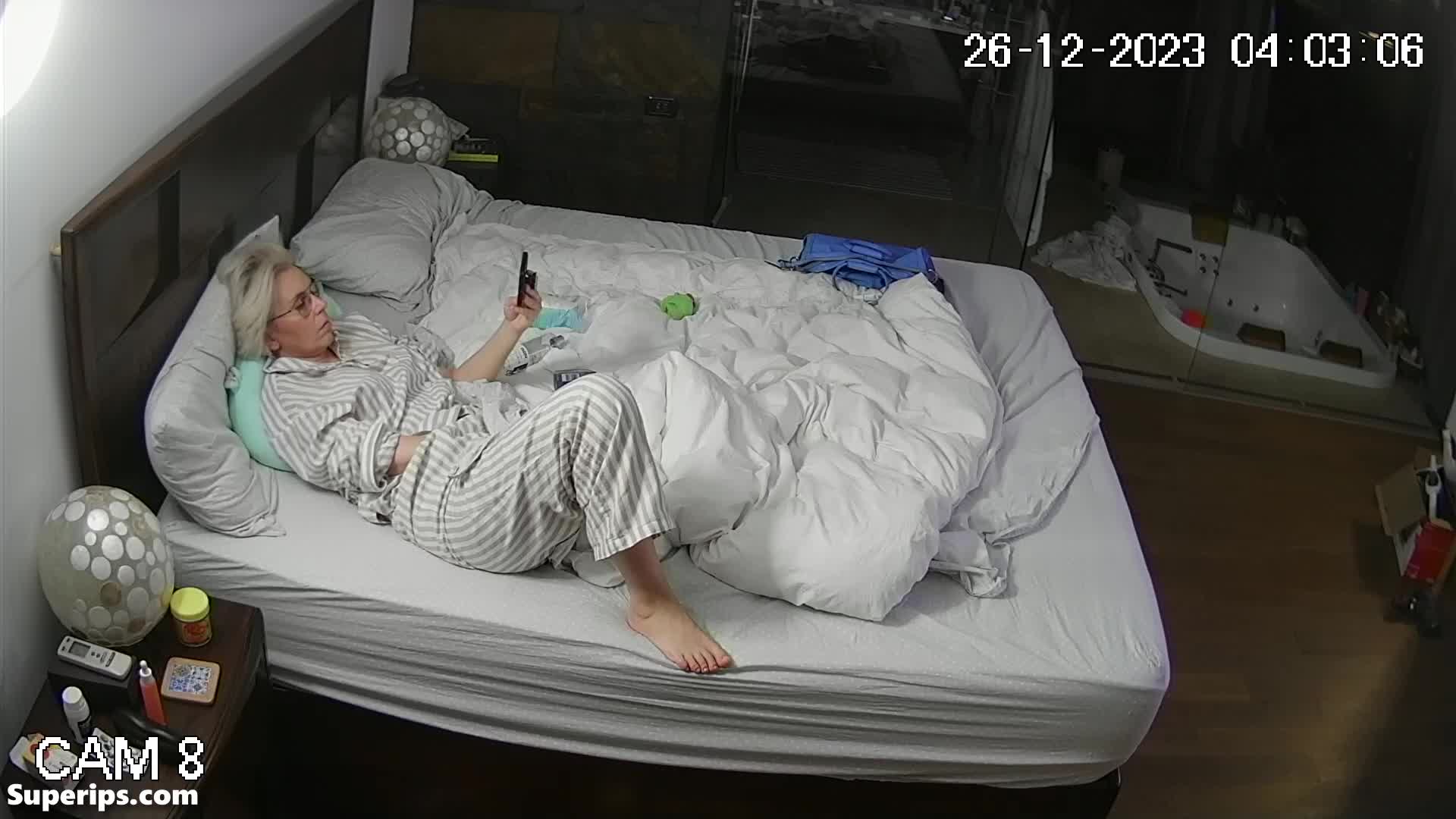IPCAM – German granny masturbates watching porn