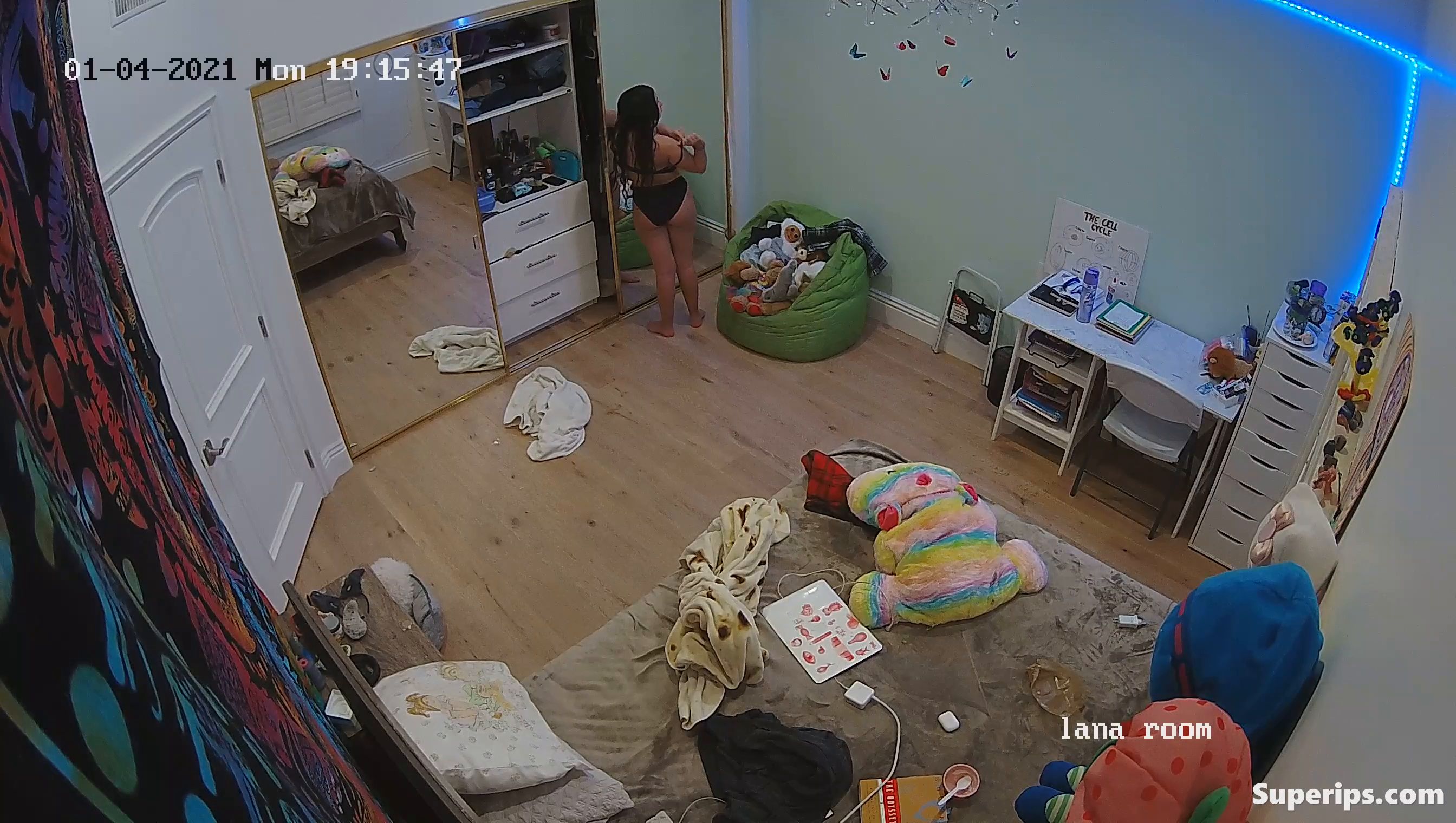 IPCAM – American brunette girl gets dressed slowly