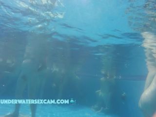 Underwatersexcam.com- What happens there in the corner with the horny couple