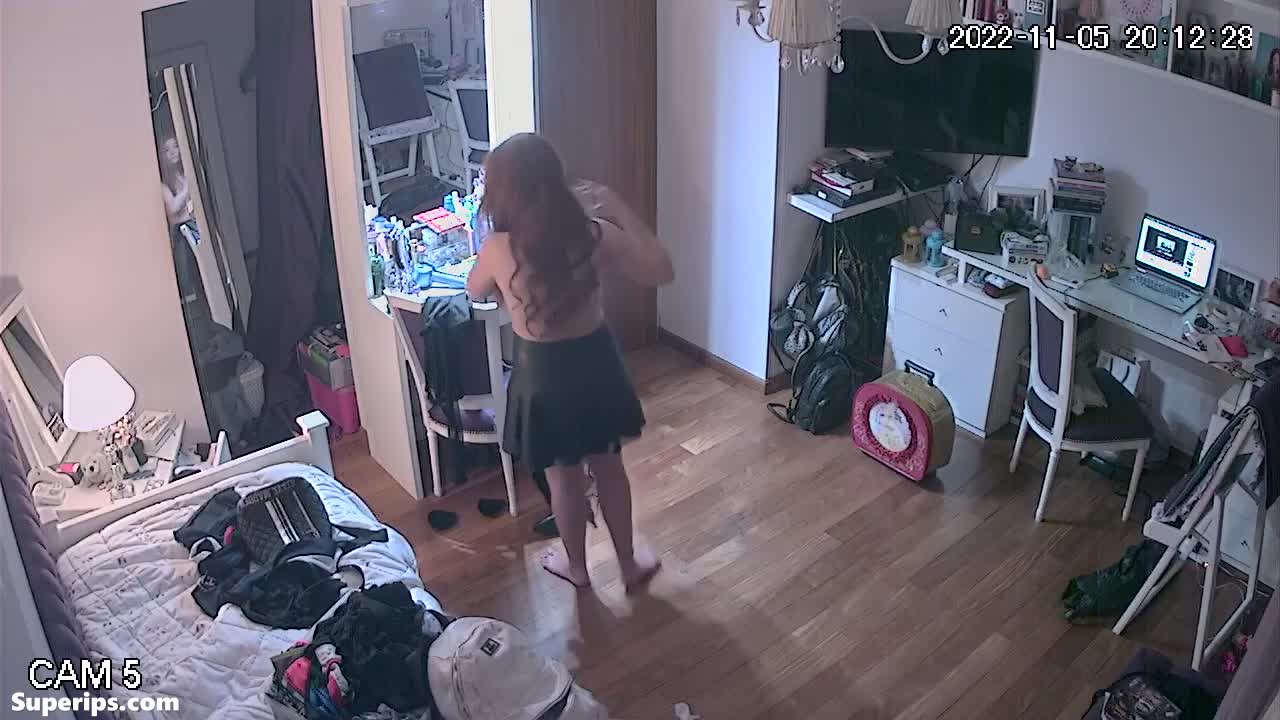 IPCAM – Freckled teen girl gets dressed in her room