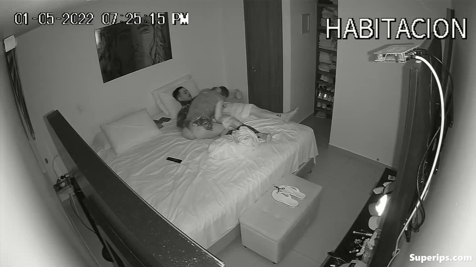 IPCAM – Latin tattooed couple fucks in their bed