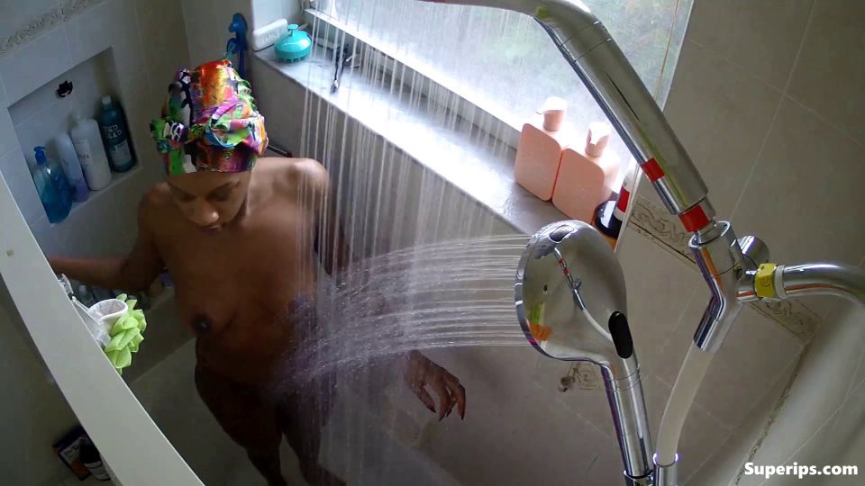 IPCAM – African American teenage girl takes a shower