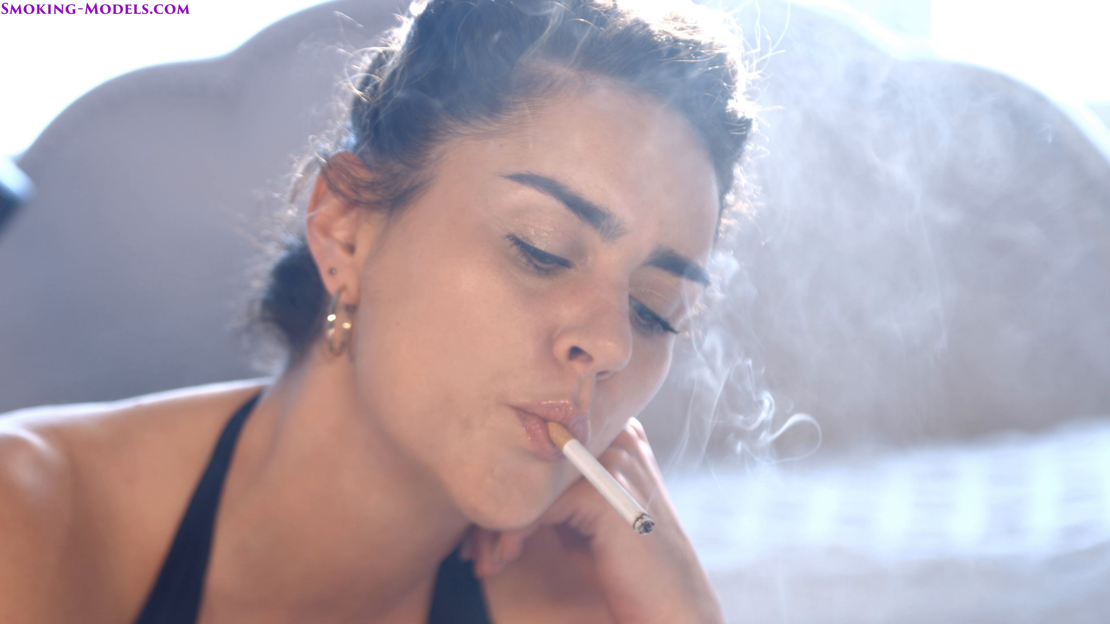 Lissa Vice chain smoking corks 100s on the bed Smoking Models
