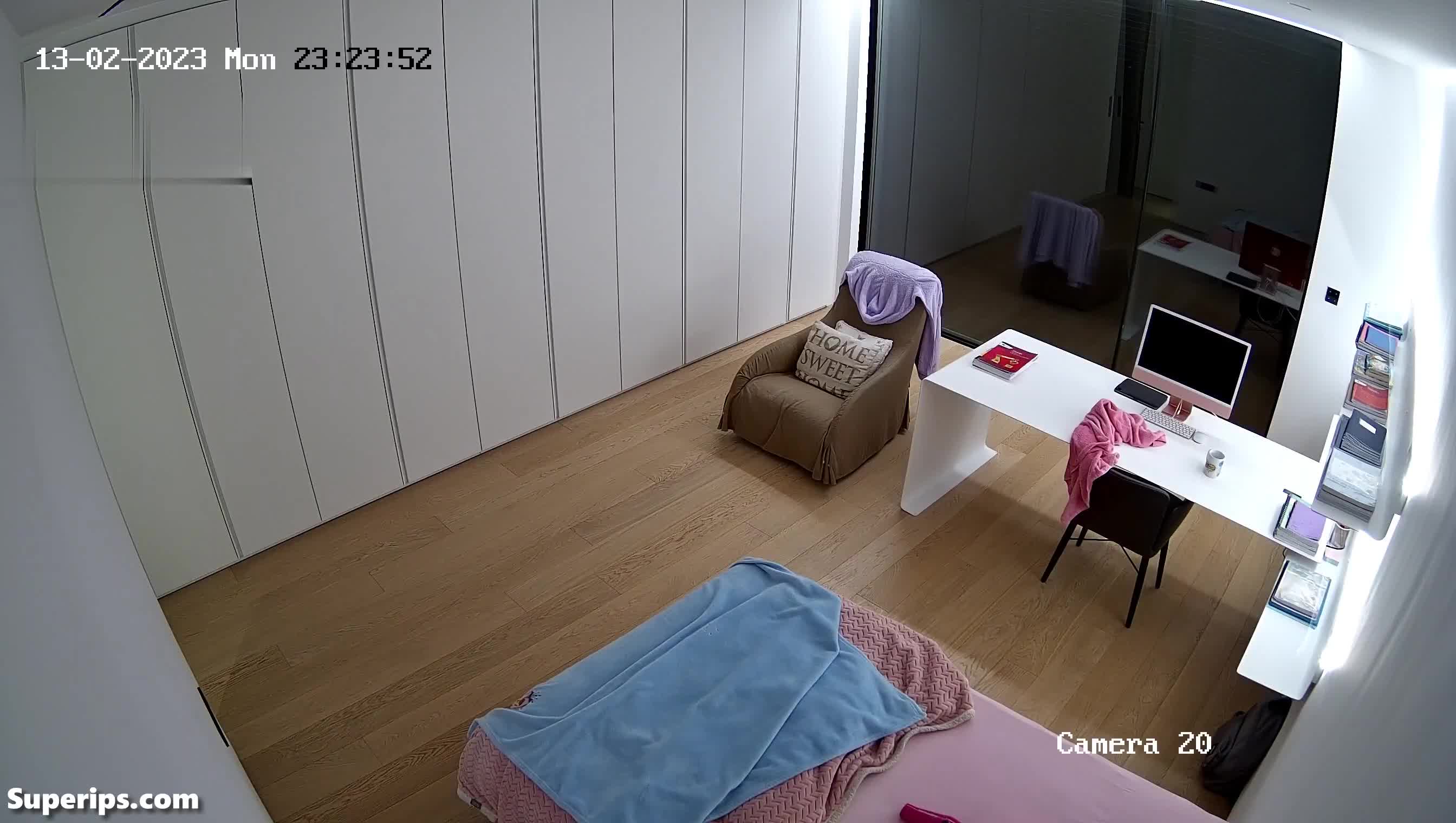 IPCAM – Young sporty girl gets dressed in her room