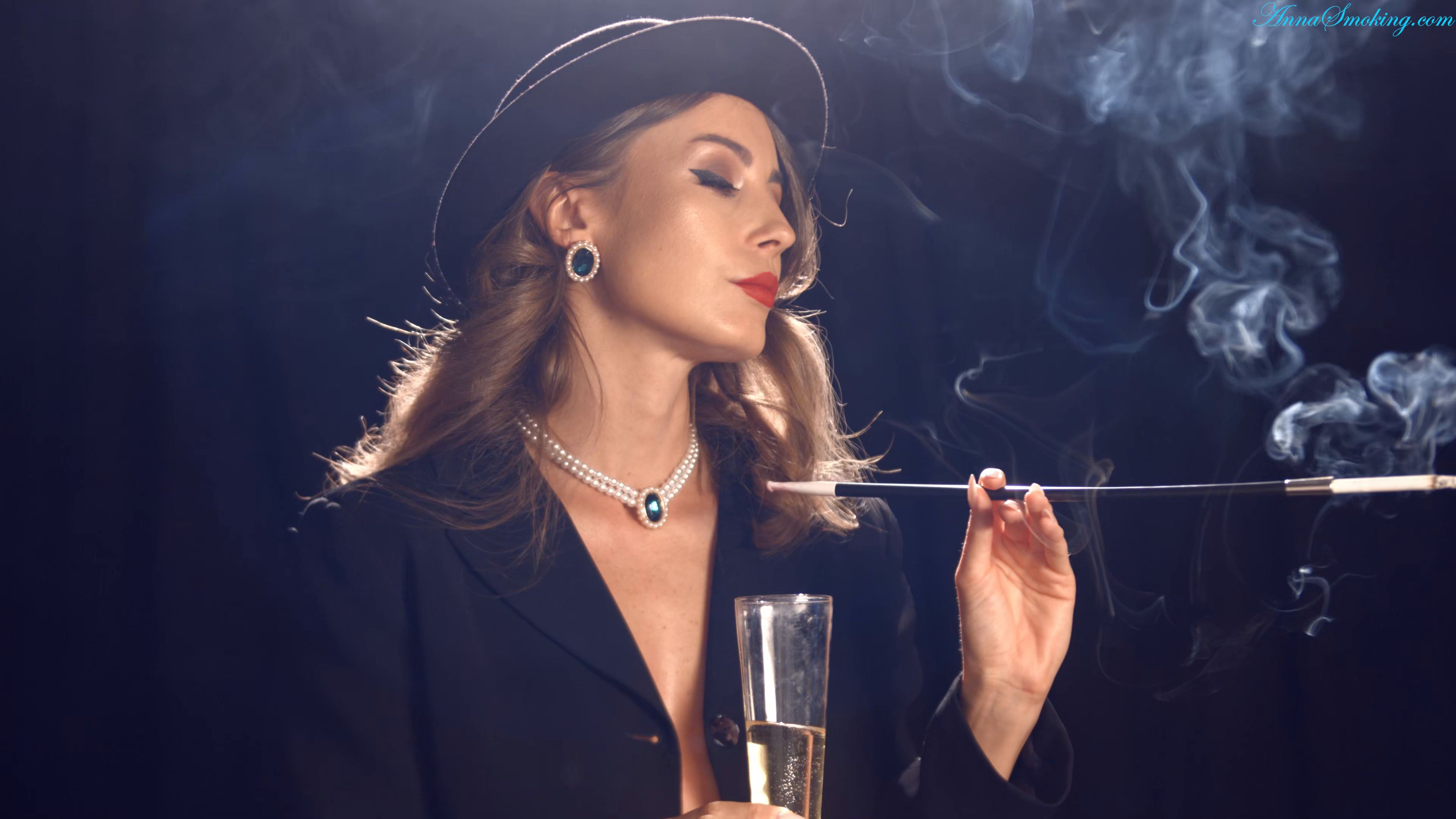 Smoking all whites using a long cigarette holder Anna Smoking