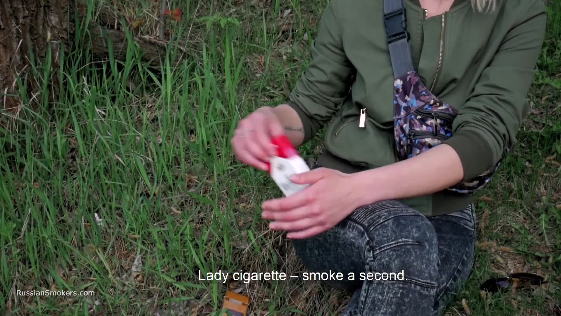 Sasha smoking two cigarettes while talking RussianSmokers