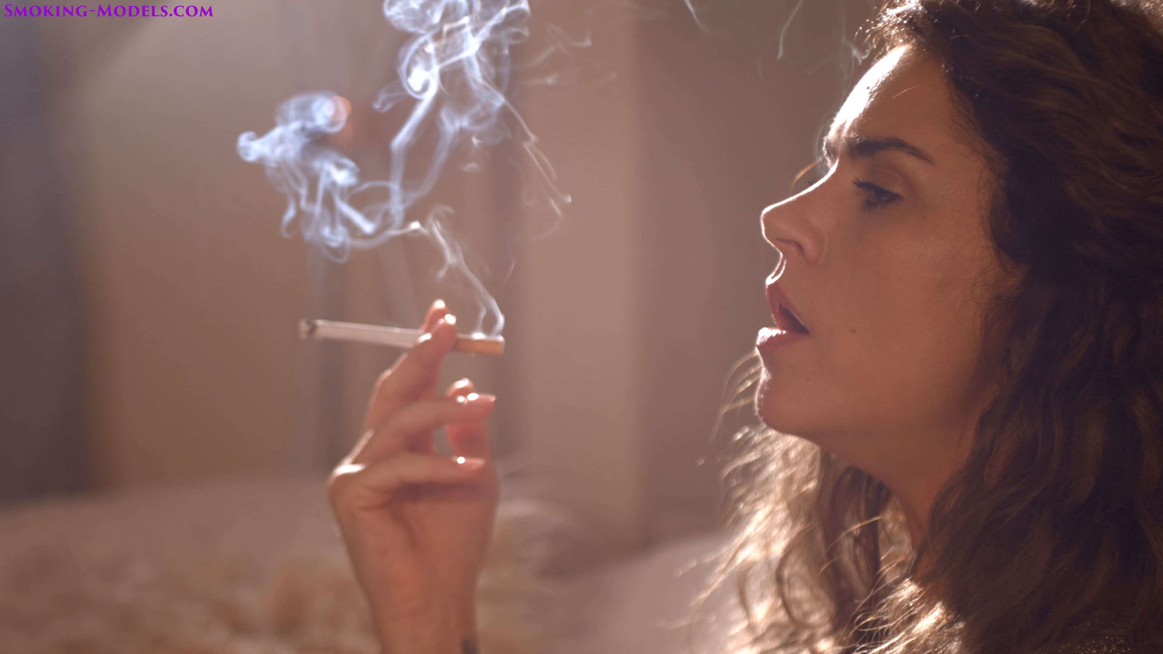 Lissa Vice smoking corks side on Smoking Models