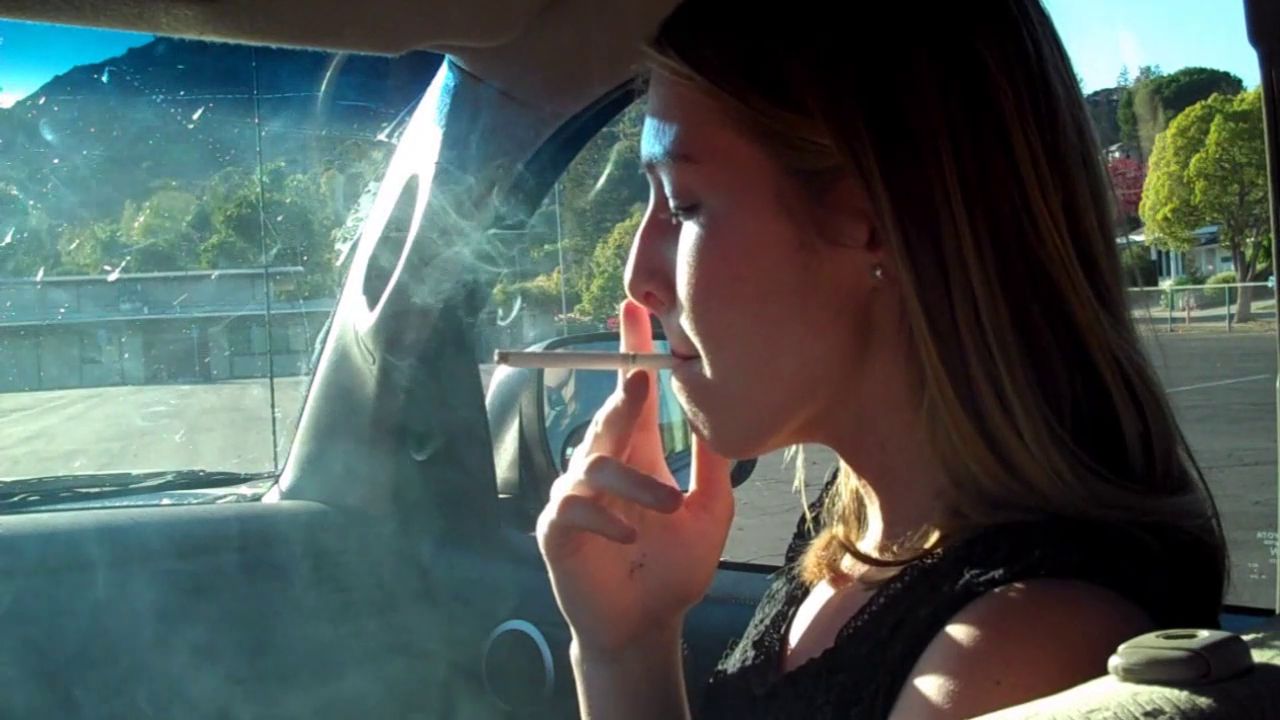 Caiti Lights-Up and Smokes in Truck San Francisco Girls