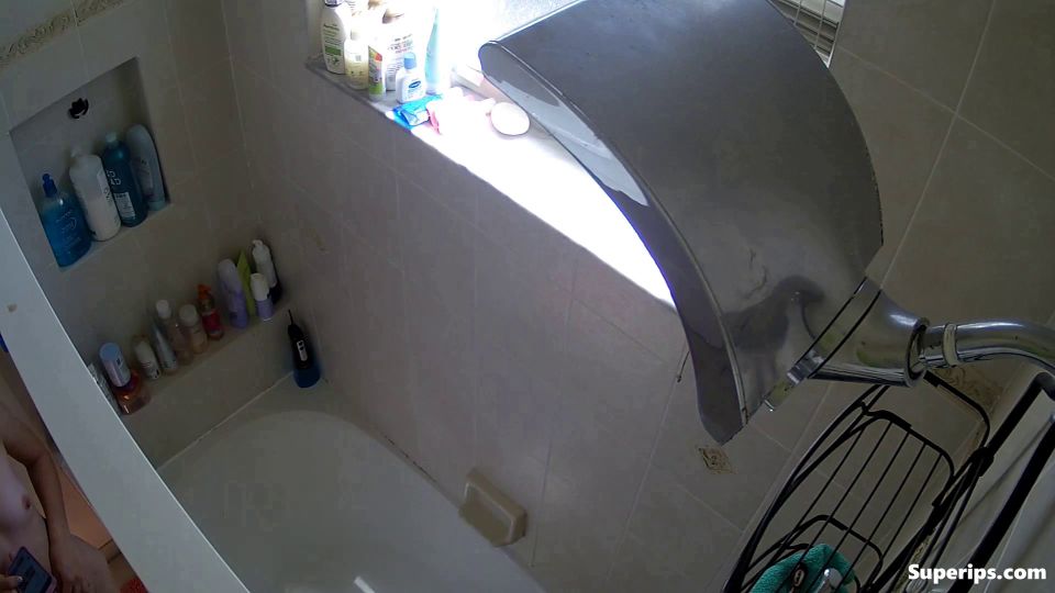 IPCAM – Petite teenage girl takes a long shower