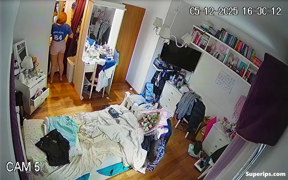 IPCAM – Redhead German girl changing clothes many times