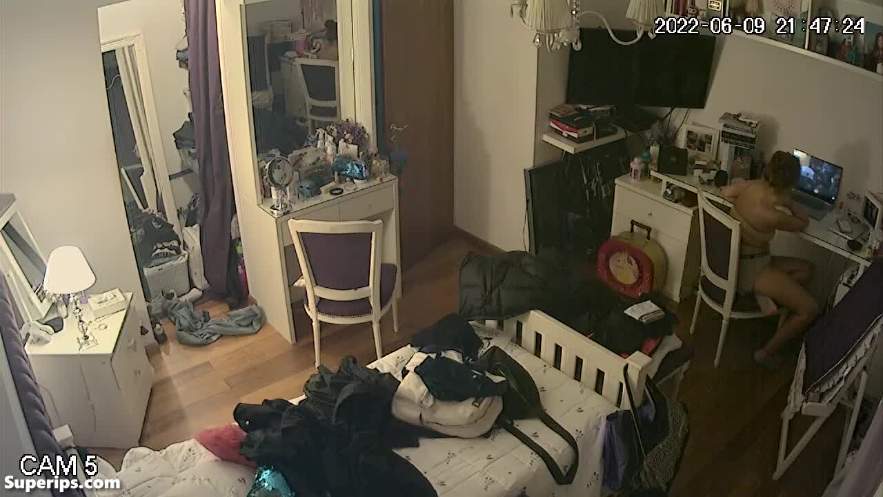IPCAM – Cute redhead girl gets dressed in her room